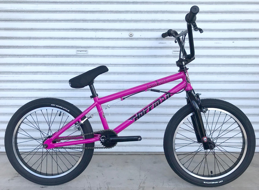 pink and black bmx bike